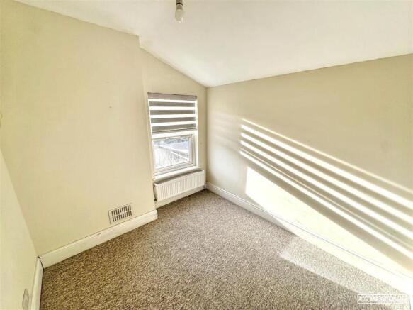 Bright bedroom filled with natural sunlight...