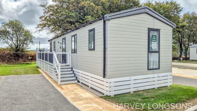 Swift Vendee holiday lodge exterior with side deck
