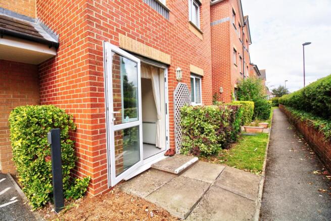 Patio door to the rear and street access