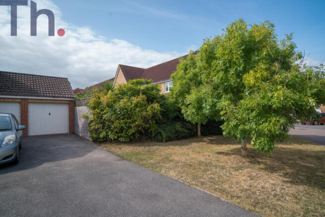 Garage, Driveway & Side Garden