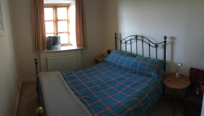 Bedroom Two: 10'7" x