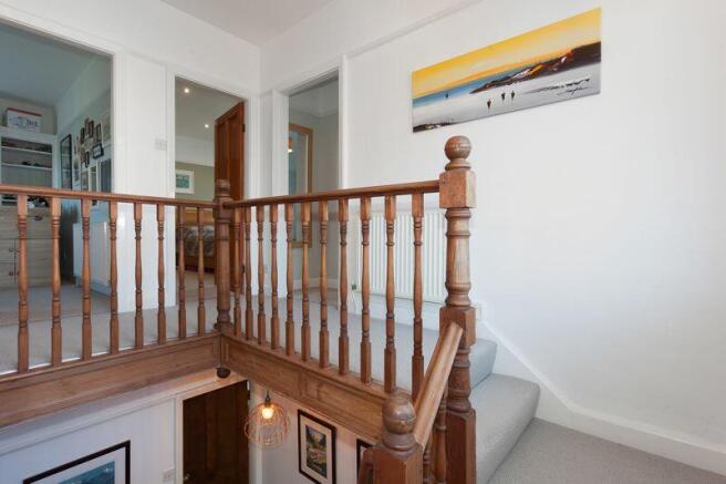 SPLIT LEVEL GALLERIED LANDING