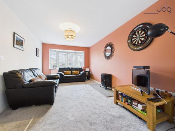 Cosy Lounge with Entrance to the Open Plan Kitchen Diner
