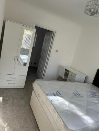 Bright, freshly redecorated double bedroom with...