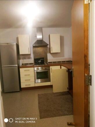 Modern kitchen with integrated appliances...