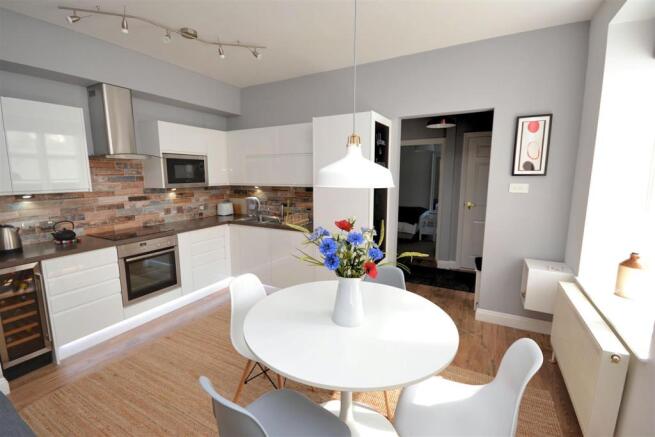 Kitchen Area w under lights.JPG