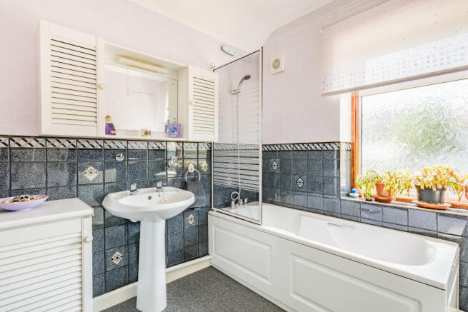 WELL APPOINTED FAMILY BATHROOM