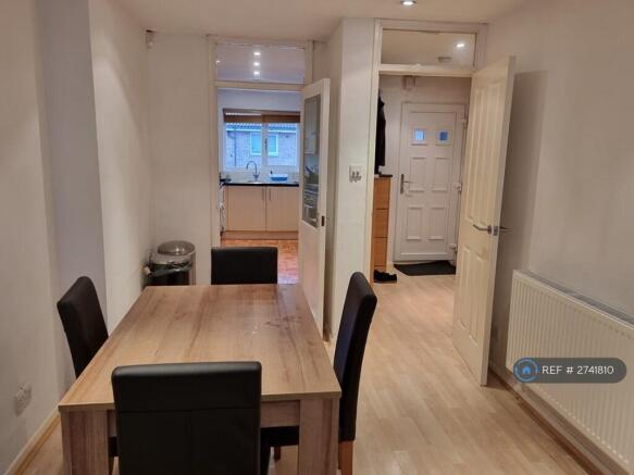 Dining Area With Access To Separate Kitchen