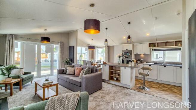 Open-plan lounge and kitchen inside the Sunseeker