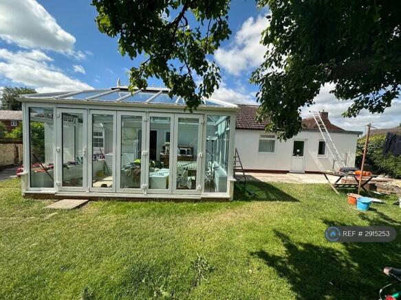 Back Garden And Conservatory