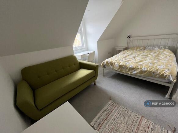 Double Bedroom With Sofa
