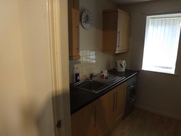Kitchen with integrated washer