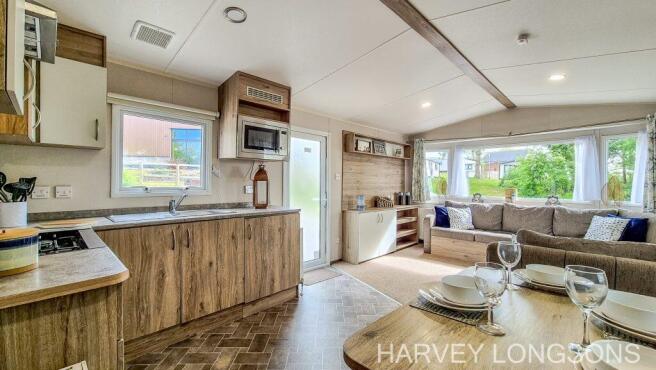 Open-plan kitchen, dining and lounge area in ABI T