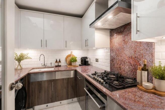 kitchen with roof lights and marble.jpeg