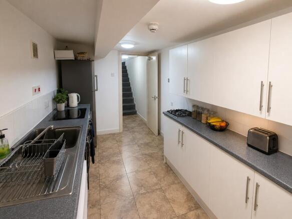 Bright modern kitchen with ample storage space...