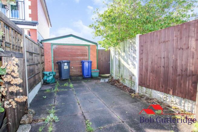 DETACHED BRICK GARAGE