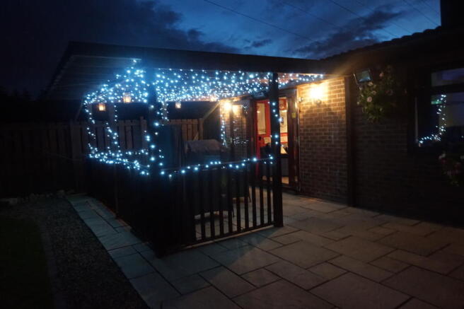 REAR EXTERNAL BAR AT NIGHT