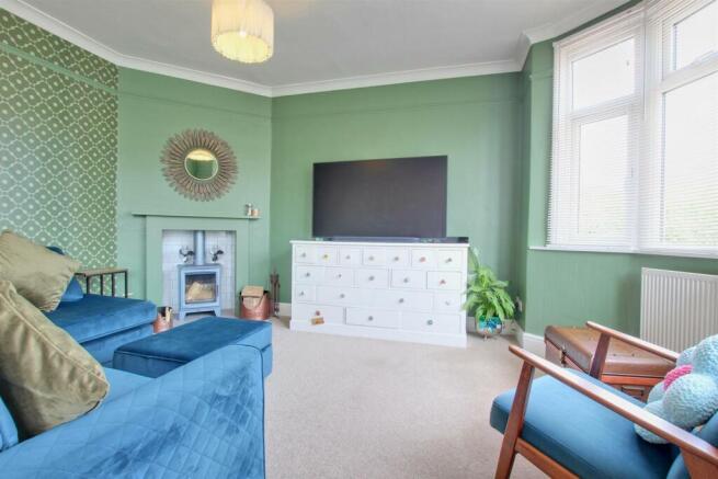 THROUGH LOUNGE AND DINING ROOM