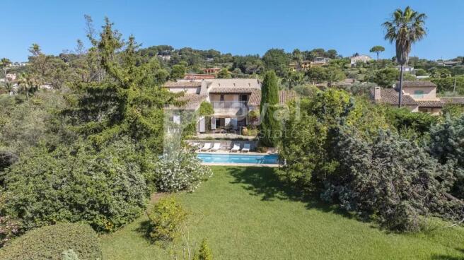 Mediterranean garden with pool in a peaceful Mougi