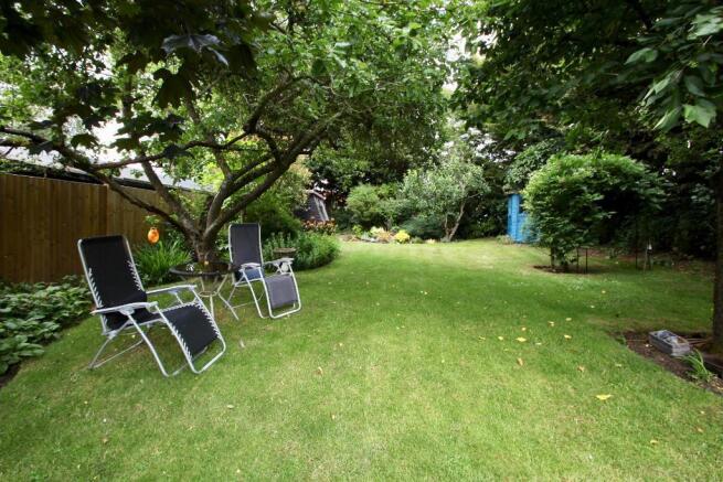 Rear garden has secluded sitting areas