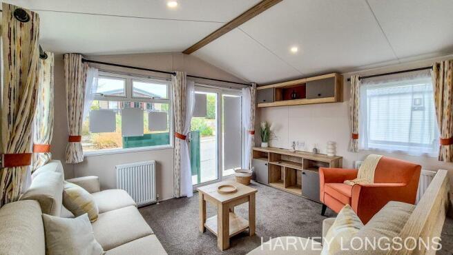 Bright lounge with patio doors and corner seating