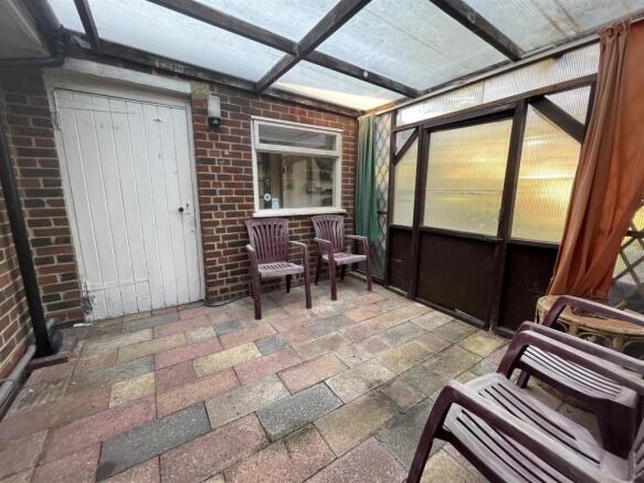 COVERED LEAN TO