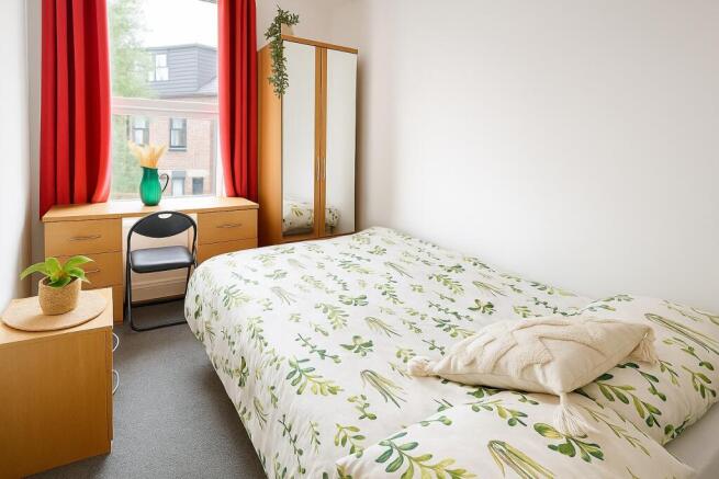 Bright, neatly presented double bedroom with a ...