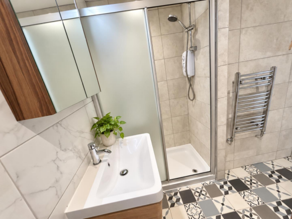Brightened interior with a leafy potted accent-8.p