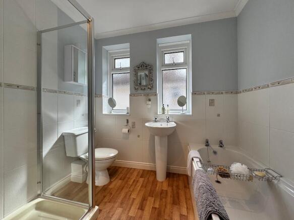Family bathroom with bath and sep shower