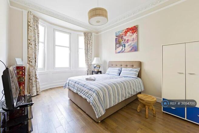 Charming Bedroom With Kingsize Bed