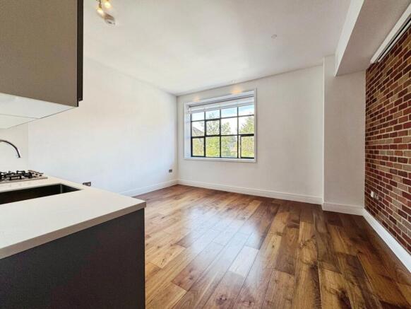 Reception/kitchen/dining area