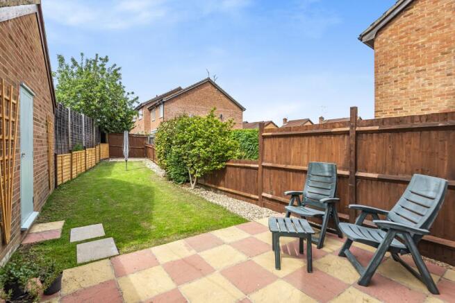 Patio and access to garage from garden