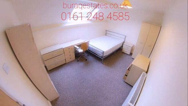 Spacious bedroom with double bed and study desk...