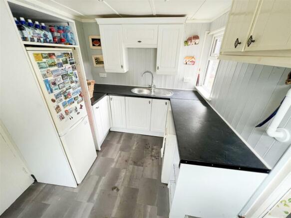 LOBBY/ UTILITY ROOM