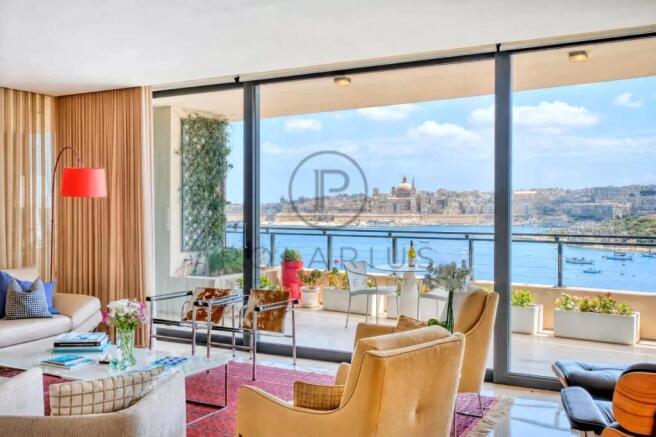 Spacious living room with stunning river views and