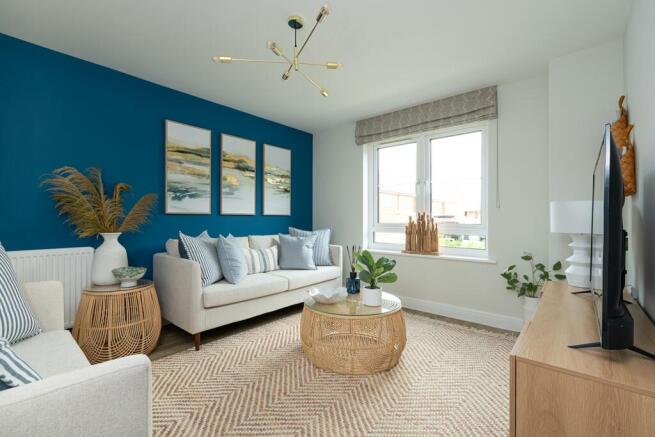 The living room offers the perfect place to unwind