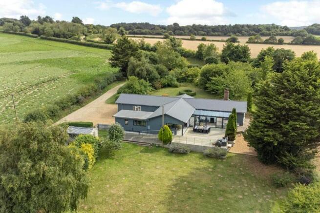 Rear view of Rectory Hill Cottage with terrace and