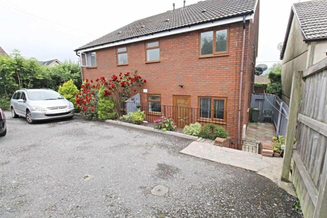 Paved patio & parking