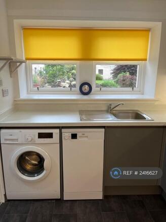 Kitchen With Windows Facing Shared Garden