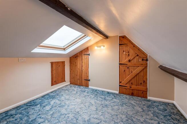 one of two loft rooms