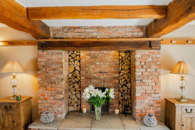 Picturesque large fireplace in the Lounge