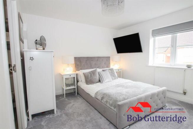 BEDROOM ONE (FRONT)