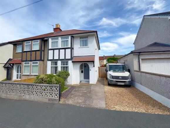 Front shot of property and driveway.jpg