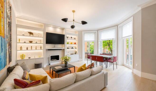 west facing reception with bay window french doors