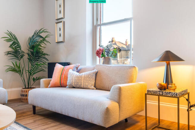 Cozy lounge steps onto balcony