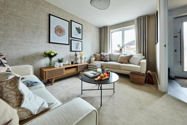 A bright and airy lounge offers a place for the family to enjoy time together