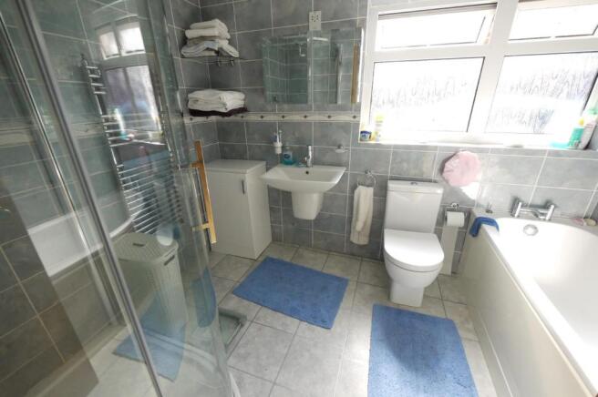 TILED BATHROOM:-