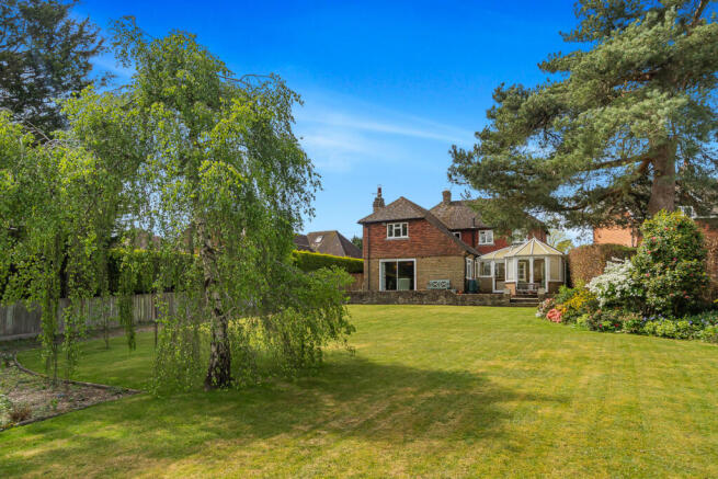 Large rear garden and rear elevation with rear terrace