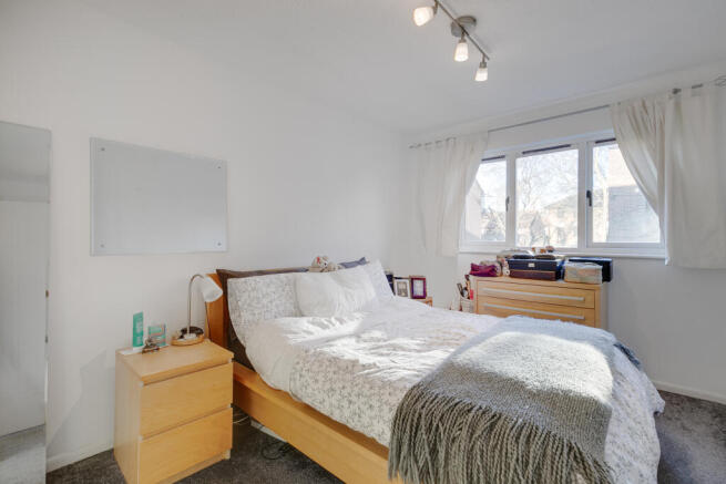 Bright East Facing Bedroom With Fitted Wardrobes