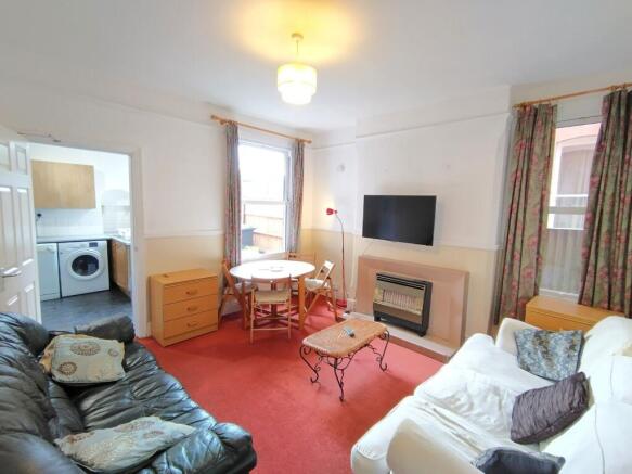 Bright, spacious lounge with cozy seating....
